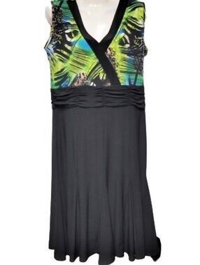 Green and Black Sleeveless, Label says size L but Is made small & fits M- NWOT